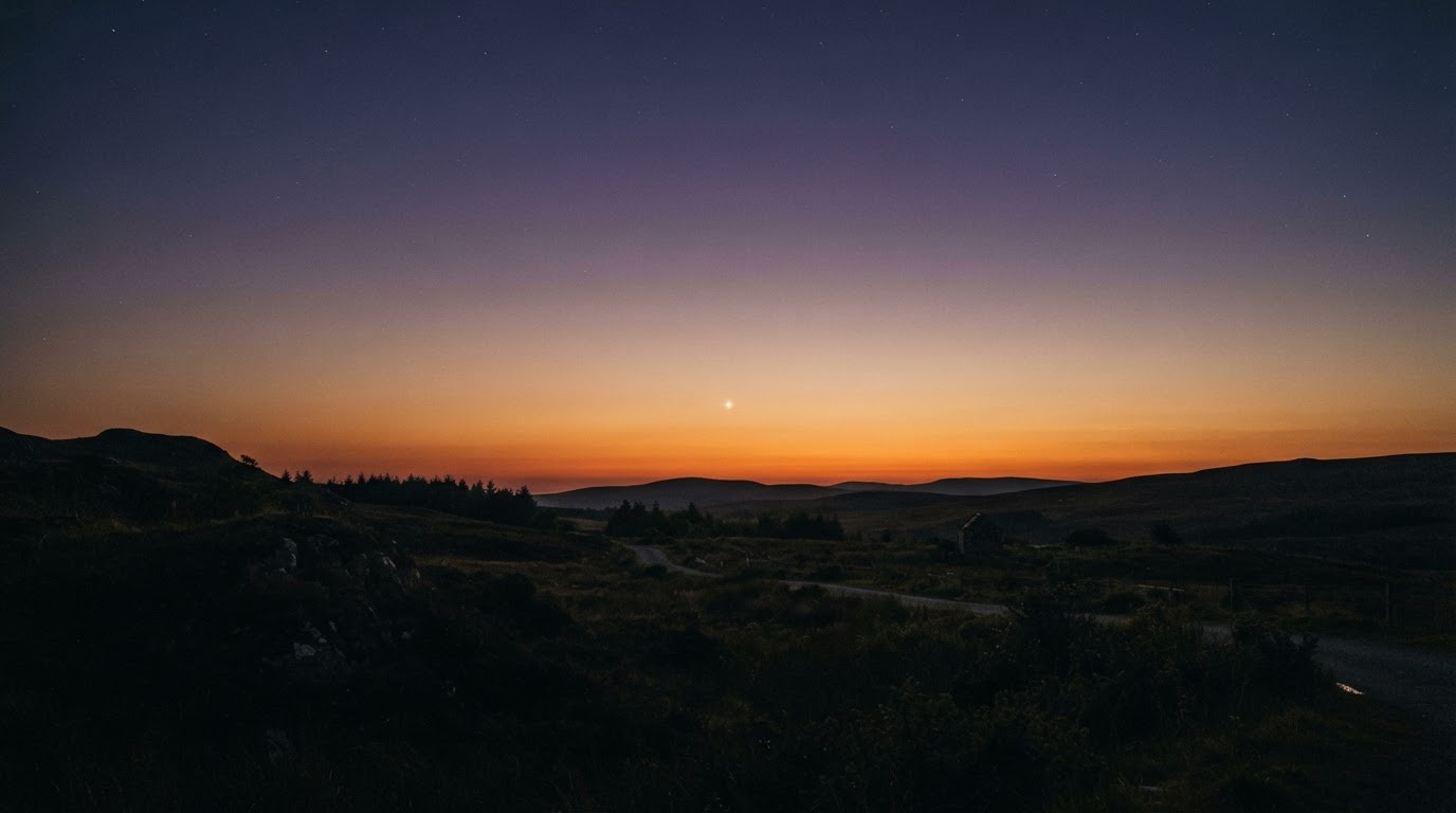 A single bright dot hanging low in a dusk sky, ambiguous whether it is a drone, a balloon, or Venus