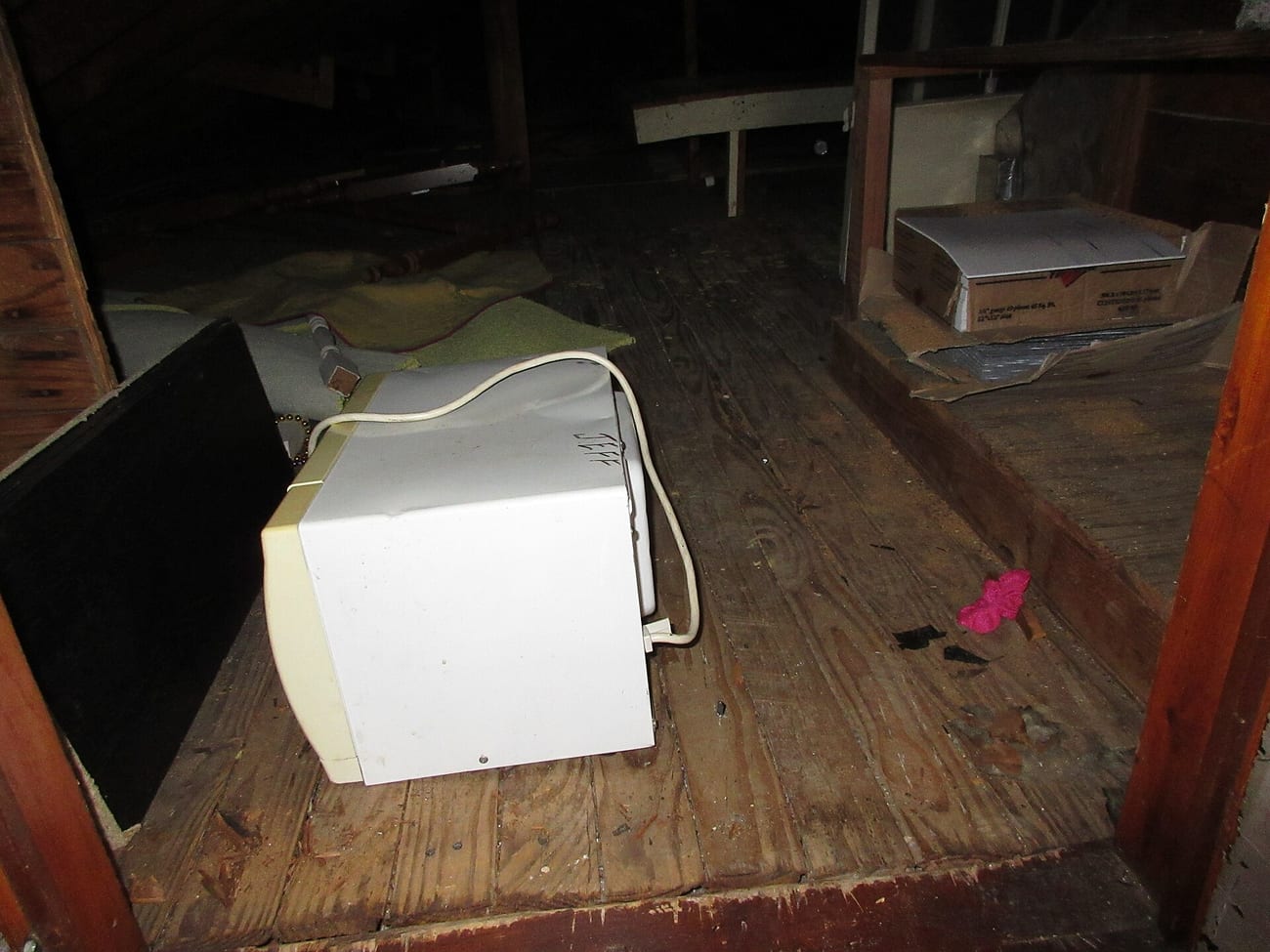 The dim attic of an old house — the kind of space where forgotten dolls end up. (Infrogmation of New Orleans / CC BY-SA 4.0)