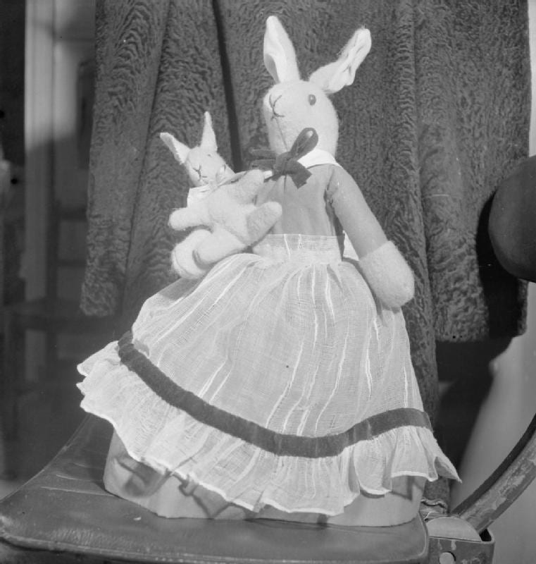 Old cloth and rag dolls of the sort given as childhood gifts for generations. (Ministry of Information / Public domain)