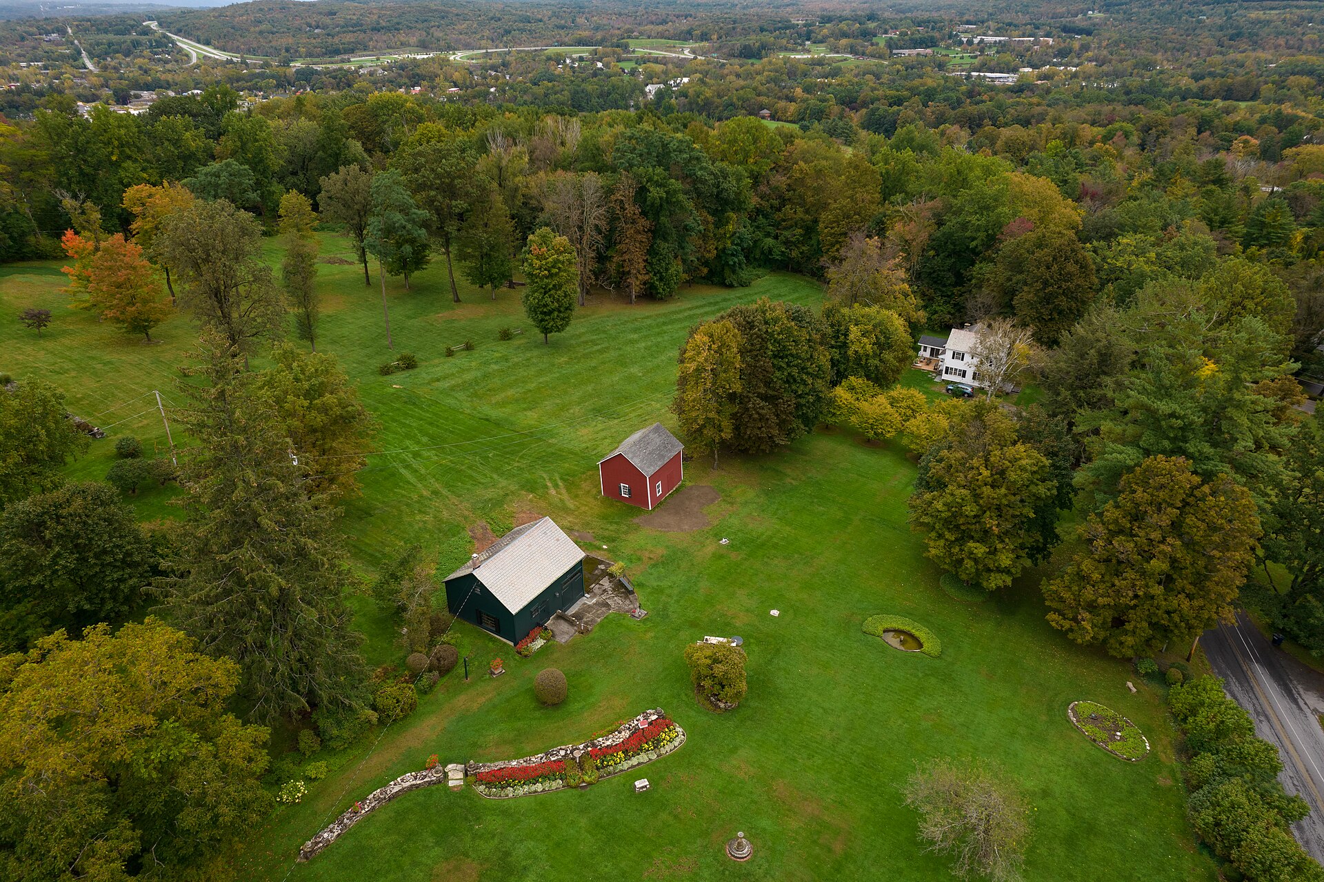 An aerial view of Bennington, Vermont — the town at the centre of these cases, with the forest running away behind it.
