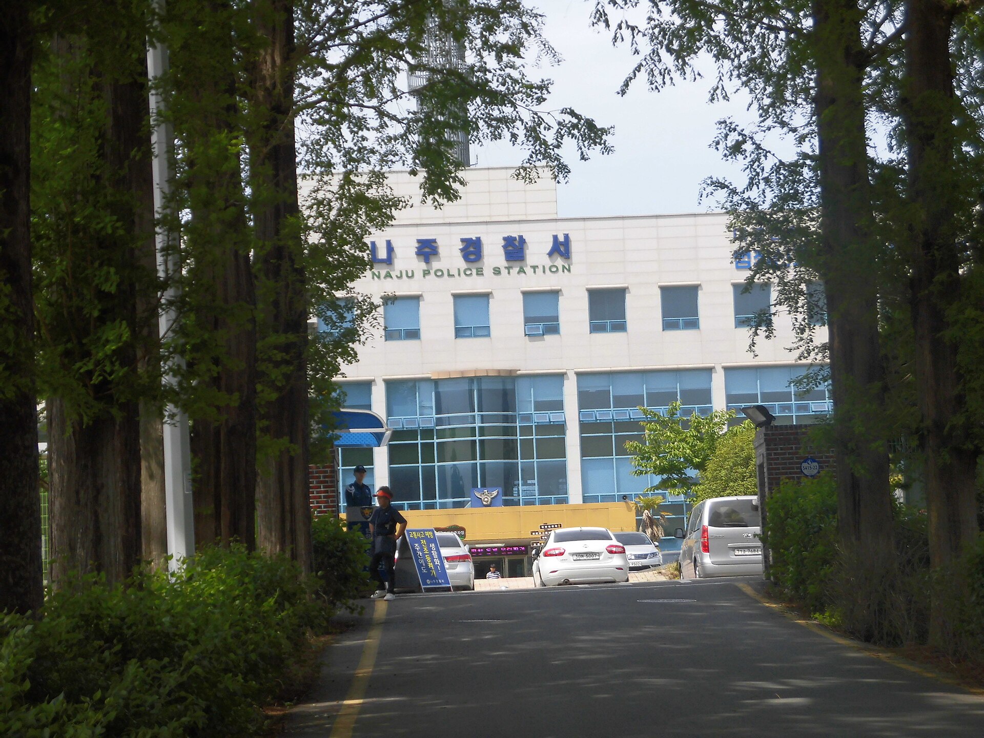 Naju Police Station today, the station that handled this case — its front gate set back behind an avenue of dawn redwoods