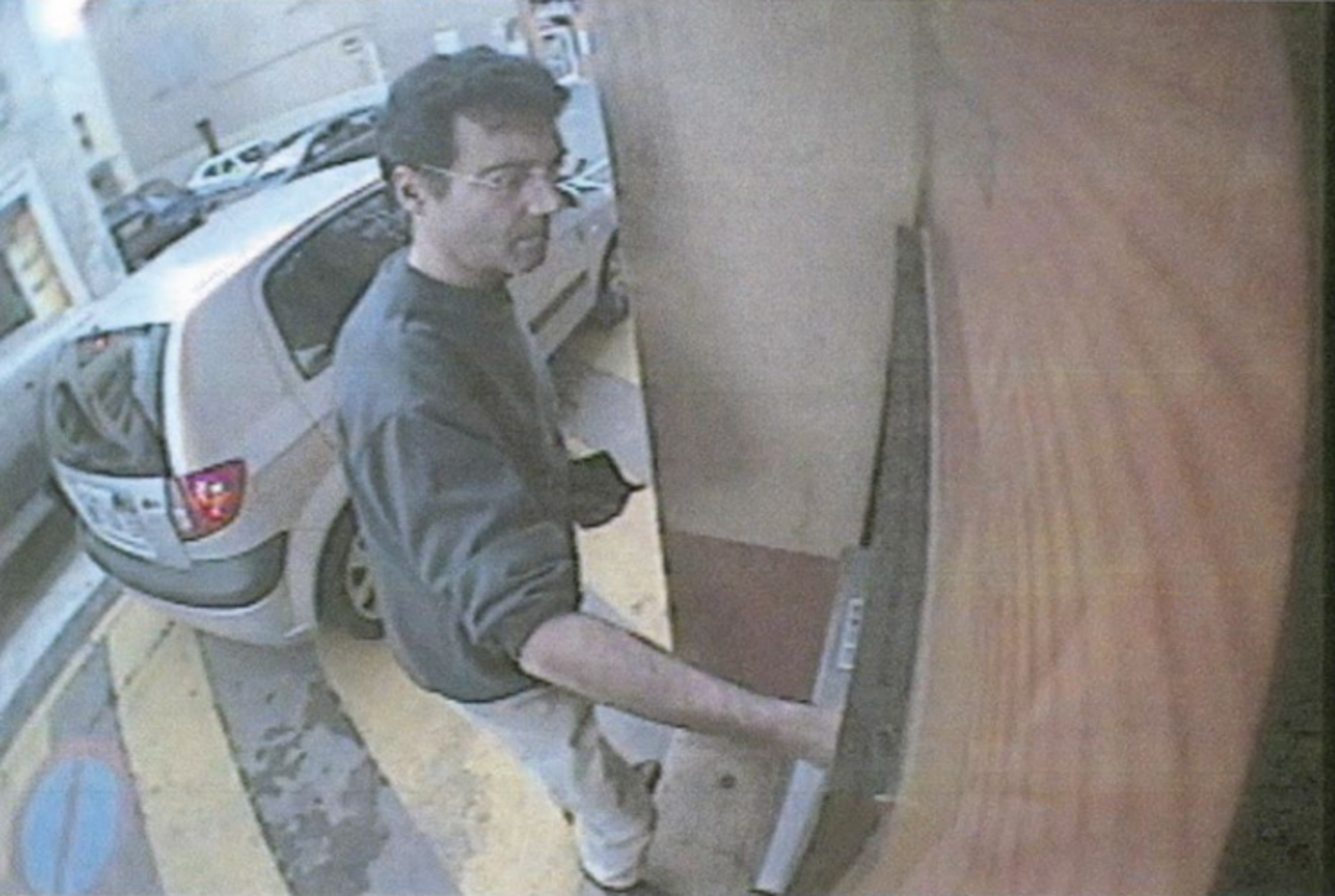 Recorded by a cash machine camera in Roquebrune-sur-Argens on 14 April 2011: withdrawing thirty euros, he glances back over his shoulder toward the lens.