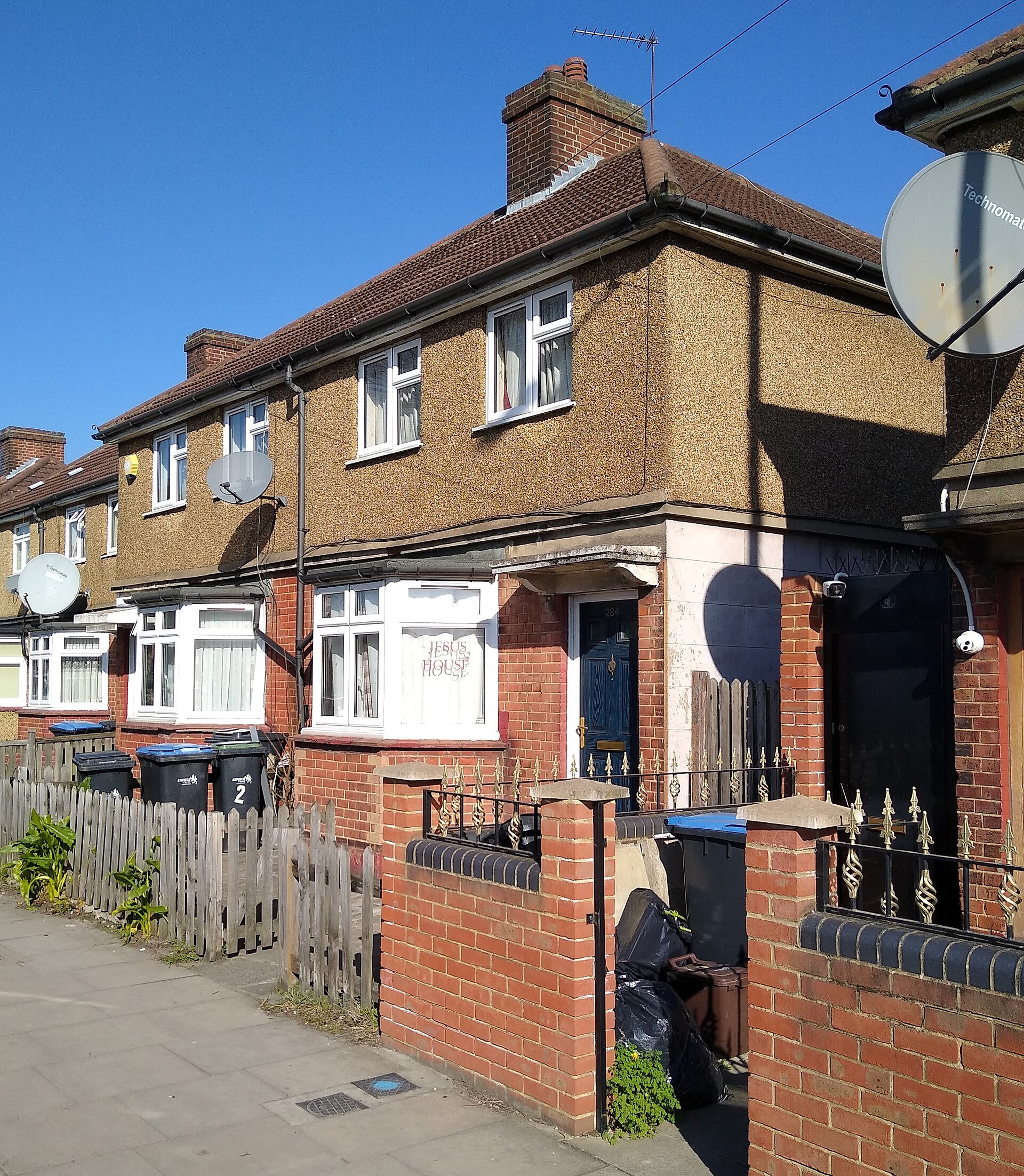 284 Green Street, Enfield, London, as it stands today — the council house the Hodgson family lived in during 1977, the number 284 visible above the front door