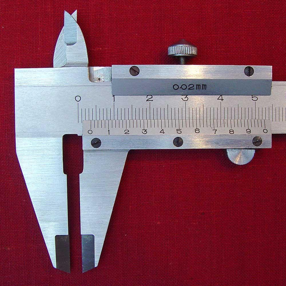 A real photograph of a vernier caliper — an industrial precision measuring tool (Wikimedia Commons / CC BY 2.5)
