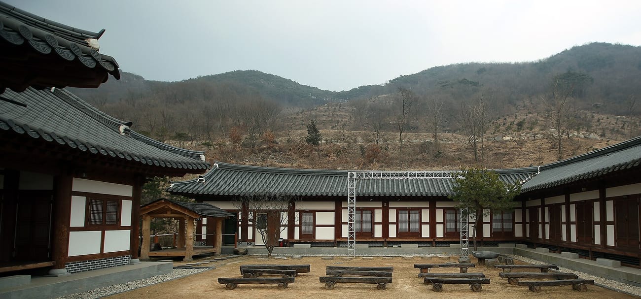A quiet mountain village in Gangwon-style terrain — remote, hemmed in by ridges. (Republic of Korea / CC BY-SA 2.0)