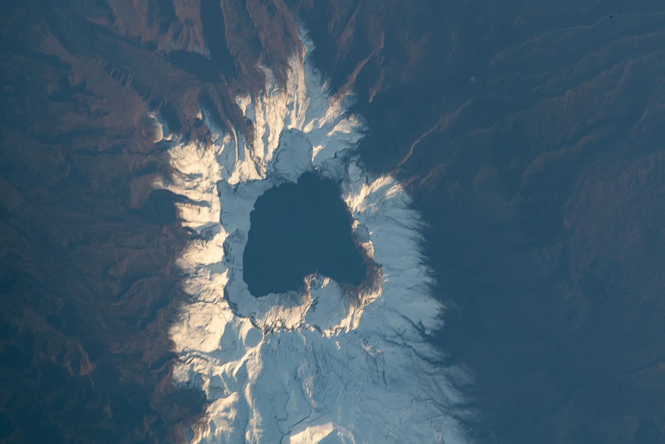 Paektu Mountain and its summit lake photographed from the International Space Station. (NASA / Public domain)