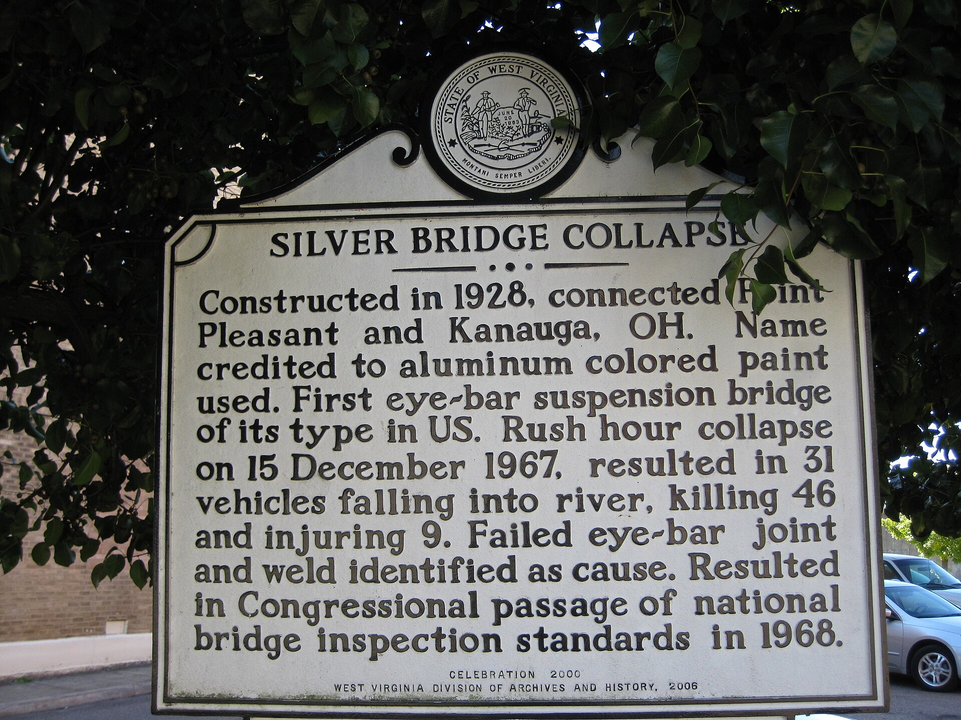 The official West Virginia historical marker recording the Silver Bridge collapse, noting that on 15 December 1967 thirty-one vehicles fell into the river and forty-six people lost their lives