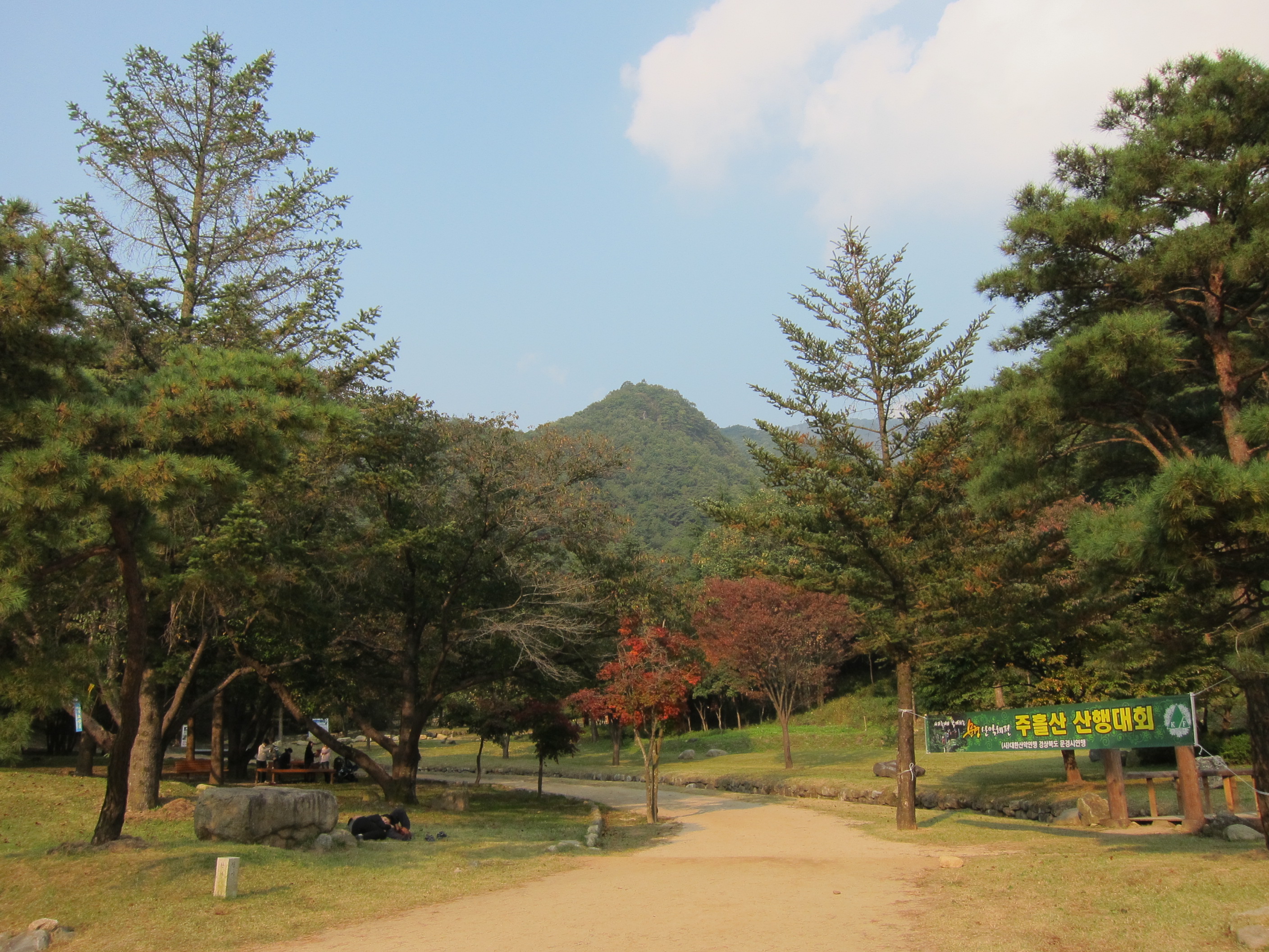 The mountains of Mungyeong — somewhere along this ridge, a man spent his final months preparing.