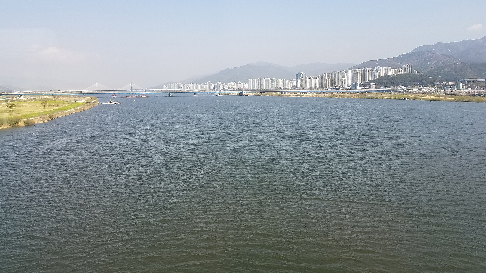 The Nakdong River seen from a train on Busan Metro Line 3 — the area near the site as it looks today