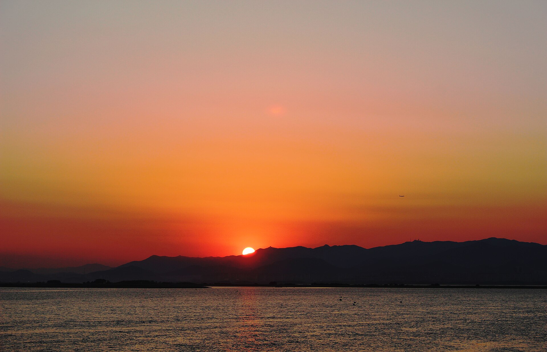 The Nakdong River at sunset — a present-day view of the area near the site, not a photograph taken at the time
