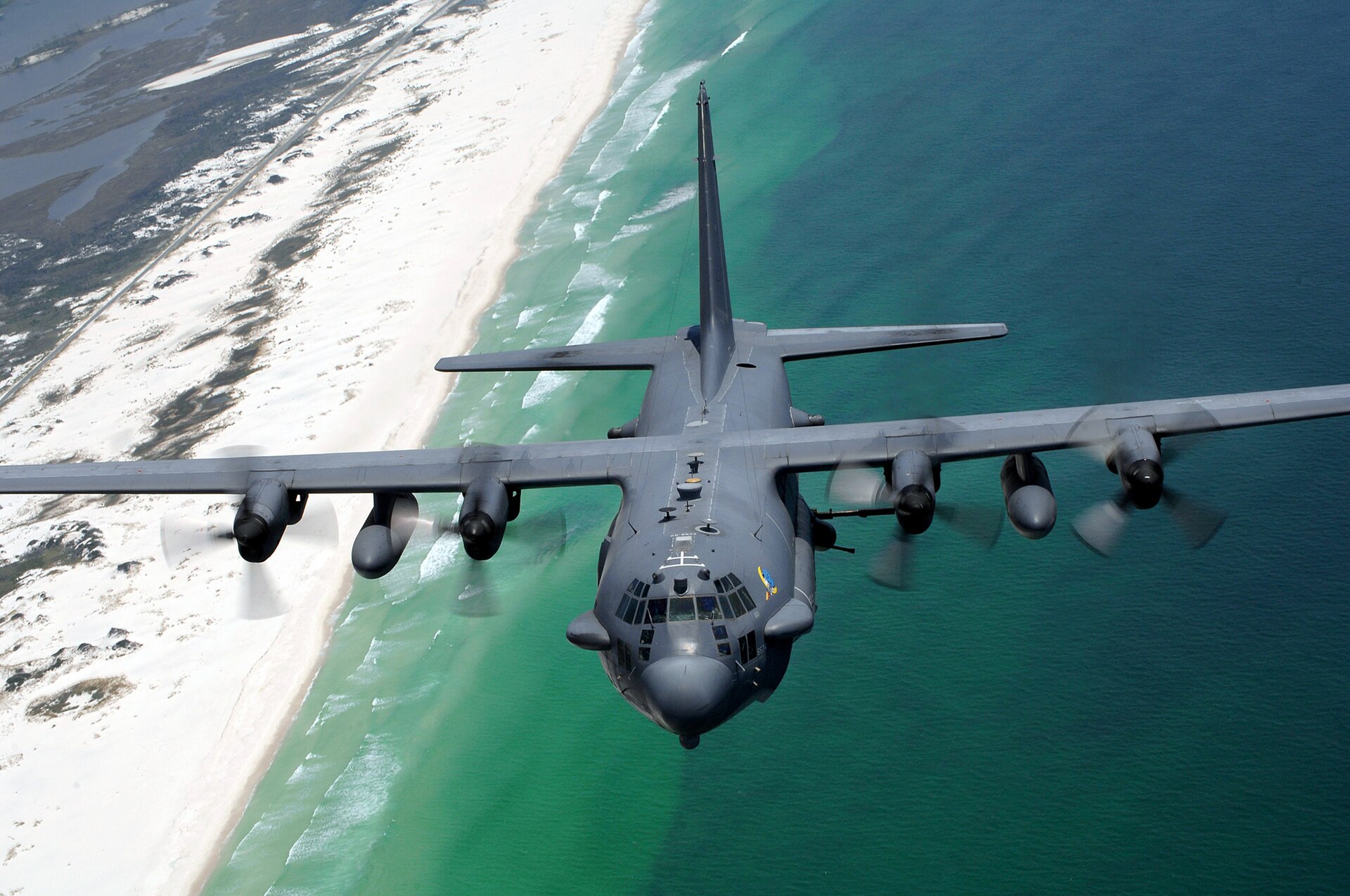 An AC-130 gunship in flight. A crew aboard one recorded the objects described in this file. (U.S. Air Force, Public Domain)