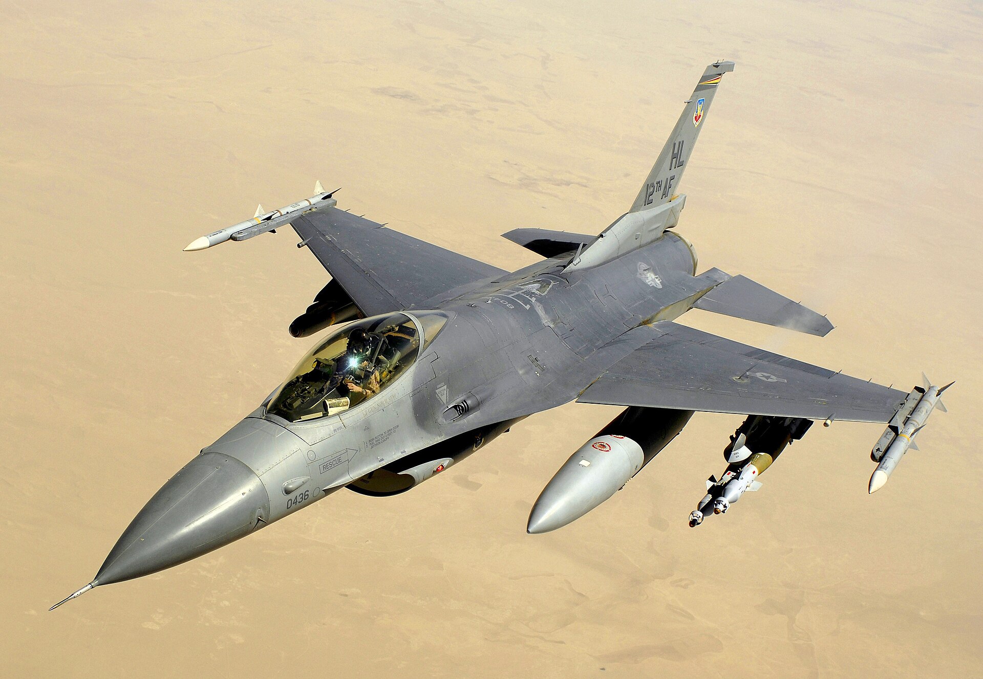 An F-16 at dusk over an airbase. Bagram was a working military airfield; the 2002 sighting was reported by a transport pilot in its airspace. (U.S. Air Force, Public Domain)