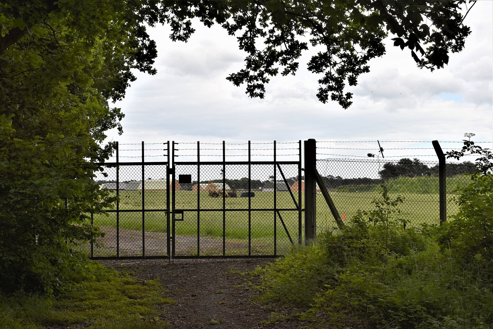 A gate in the perimeter fence at Bentwaters — the base boundary near which the sightings took place, photographed today