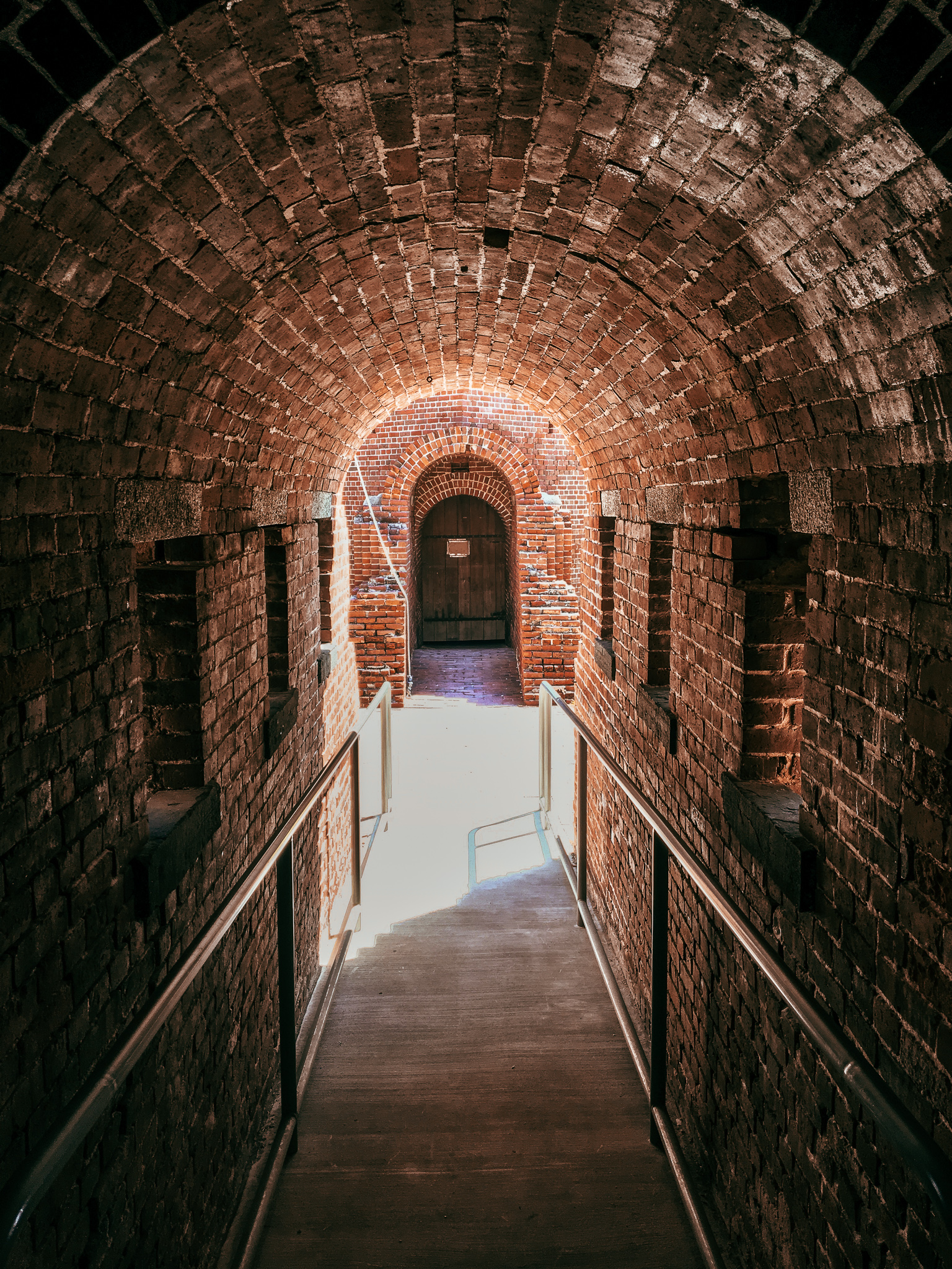 Inside the Fort East Martello Museum, where Robert the Doll is kept — the old fort’s brick archways (Wikimedia Commons)