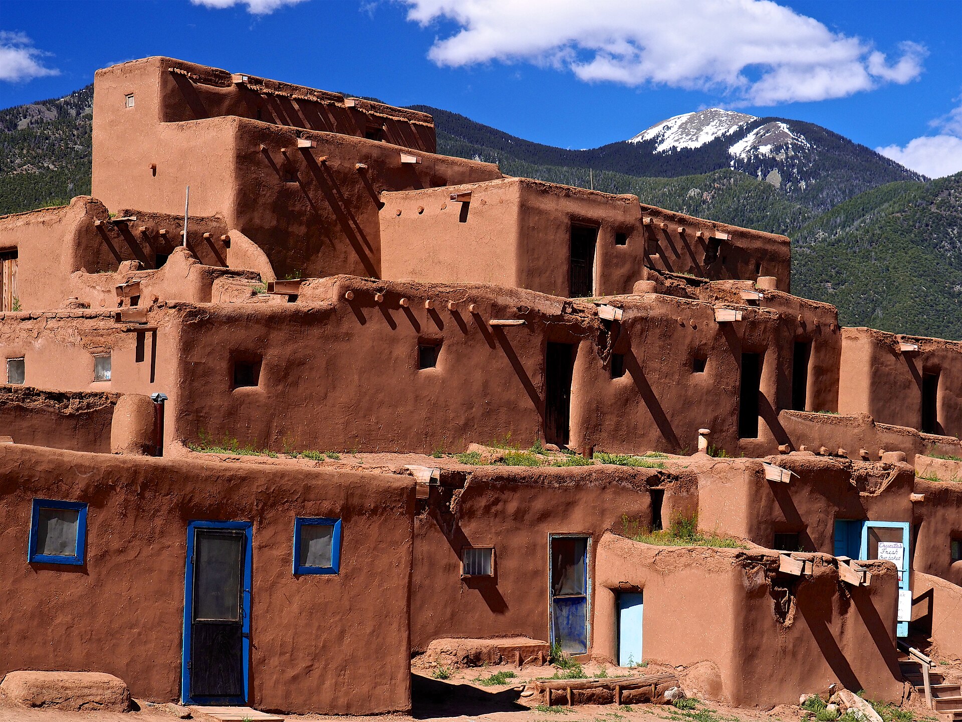 Taos Pueblo — the name of this high-desert settlement, inhabited for nearly a thousand years, now belongs to a sound reported all over the world