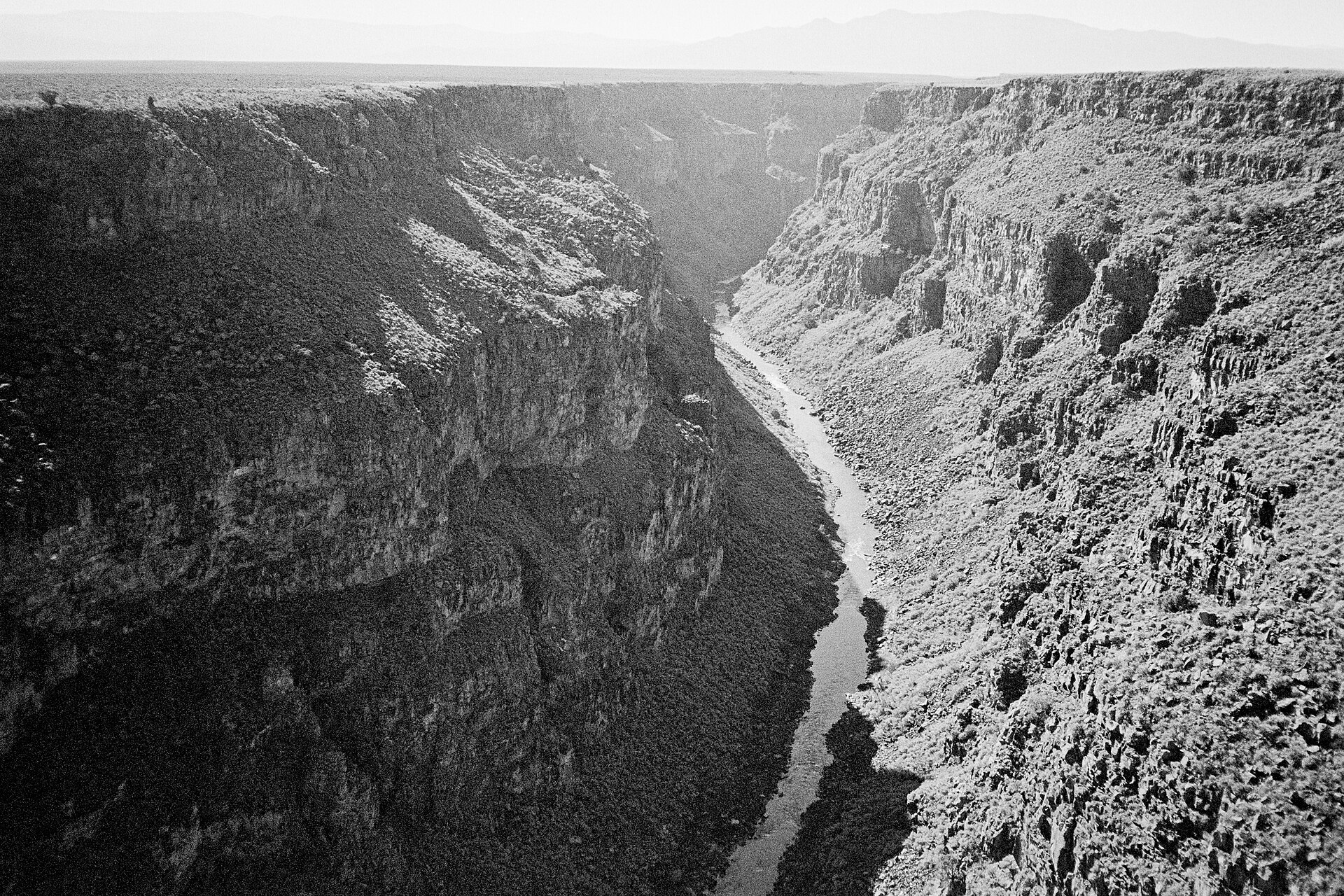 The Rio Grande Gorge at Taos — the flat, open plateau terrain across which low-frequency sound carries for miles