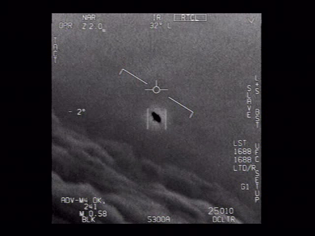An actual frame from the U.S. Navy UFO footage officially released by the Pentagon. Not a grainy civilian clip, but a frame captured by the military's infrared sensors. (US Navy / DoD, Public Domain)
