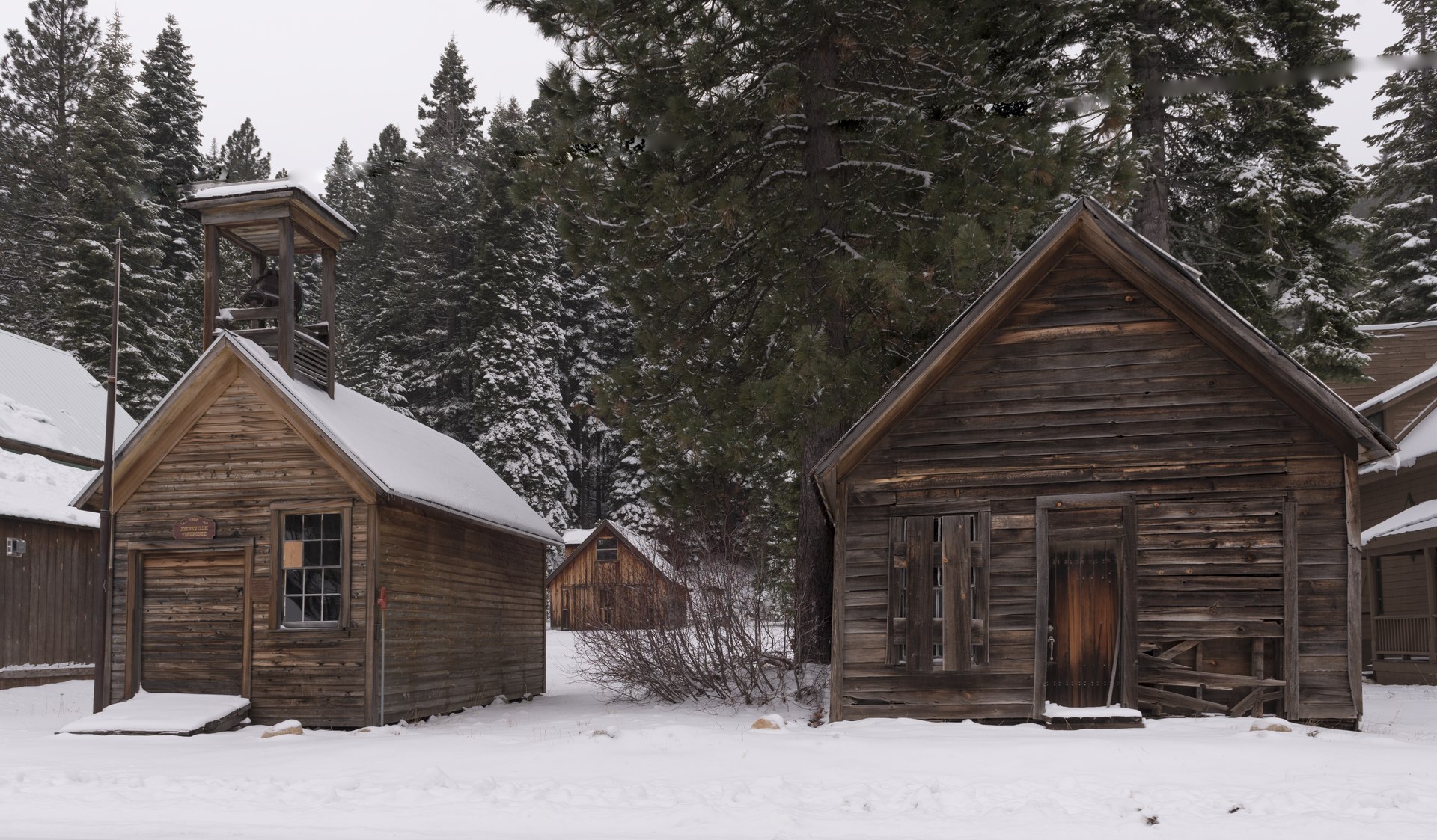 The snowbound remains of Johnsville, an abandoned mining town in Plumas County, showing what this stretch of mountain country becomes in winter