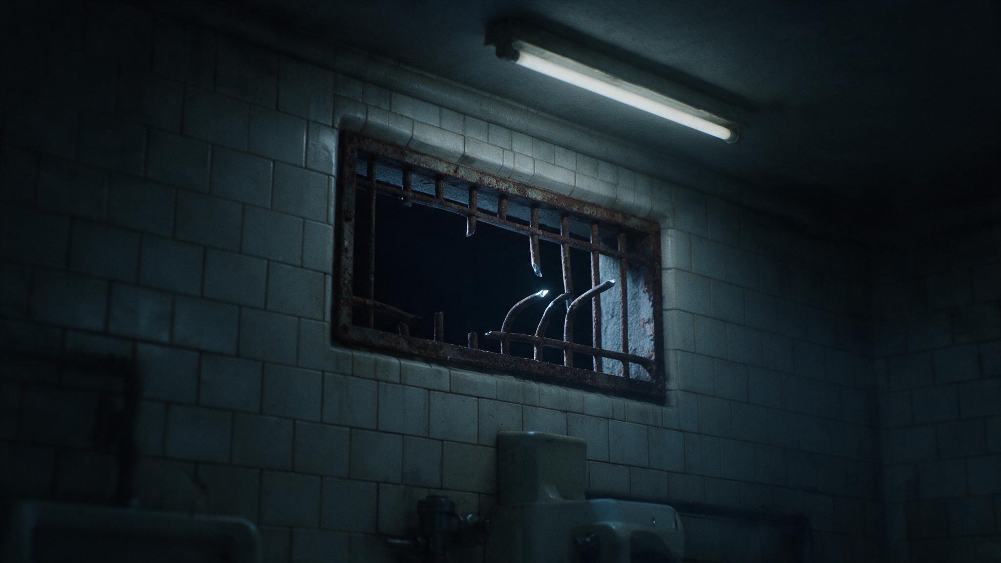 A narrow ventilation shaft set high in a prison lavatory wall at dawn with severed iron bars, cold lighting
