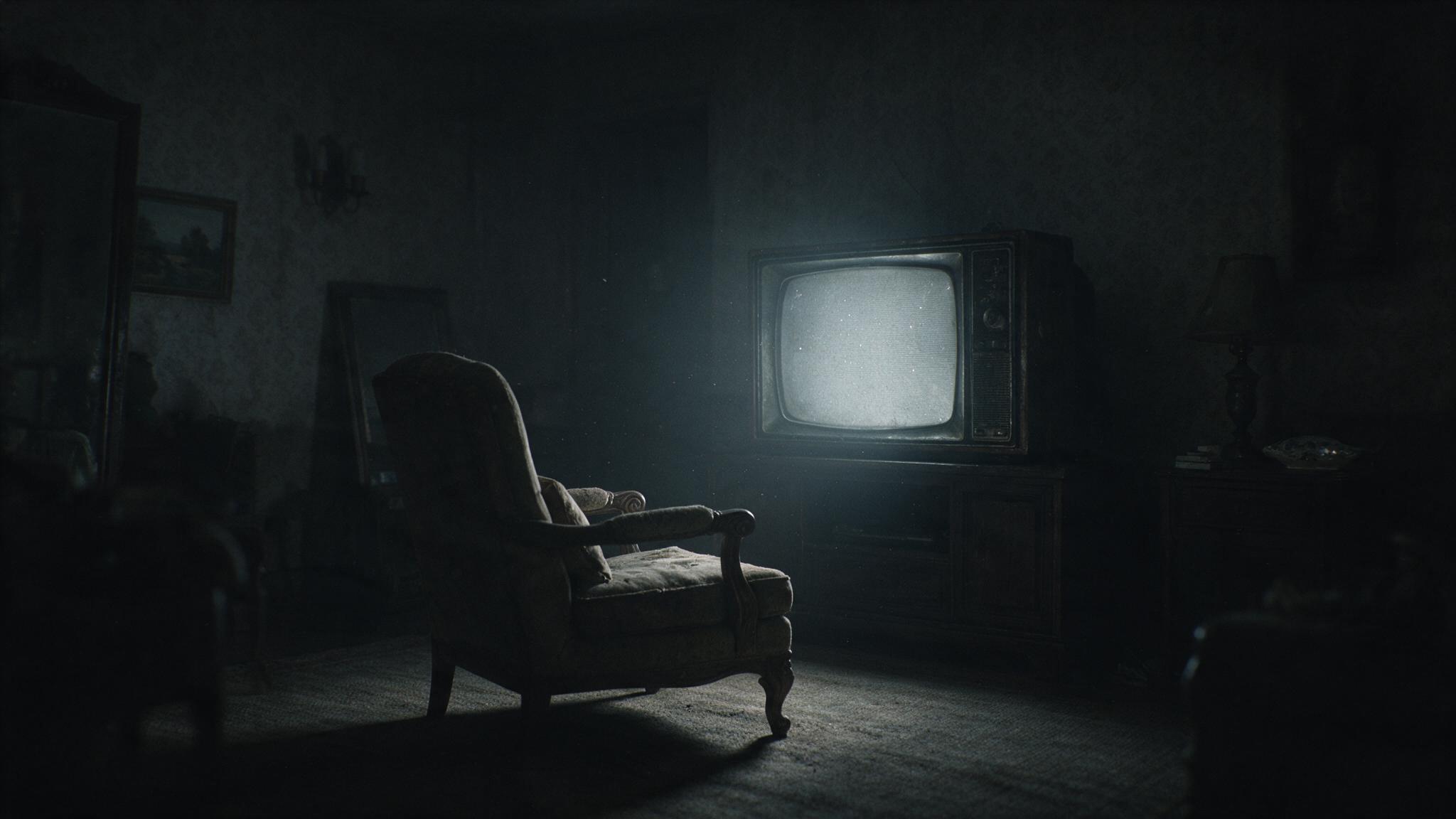 A vintage 1970s living room lit only by the grey glow of a television screen, empty chair, no people, no legible text